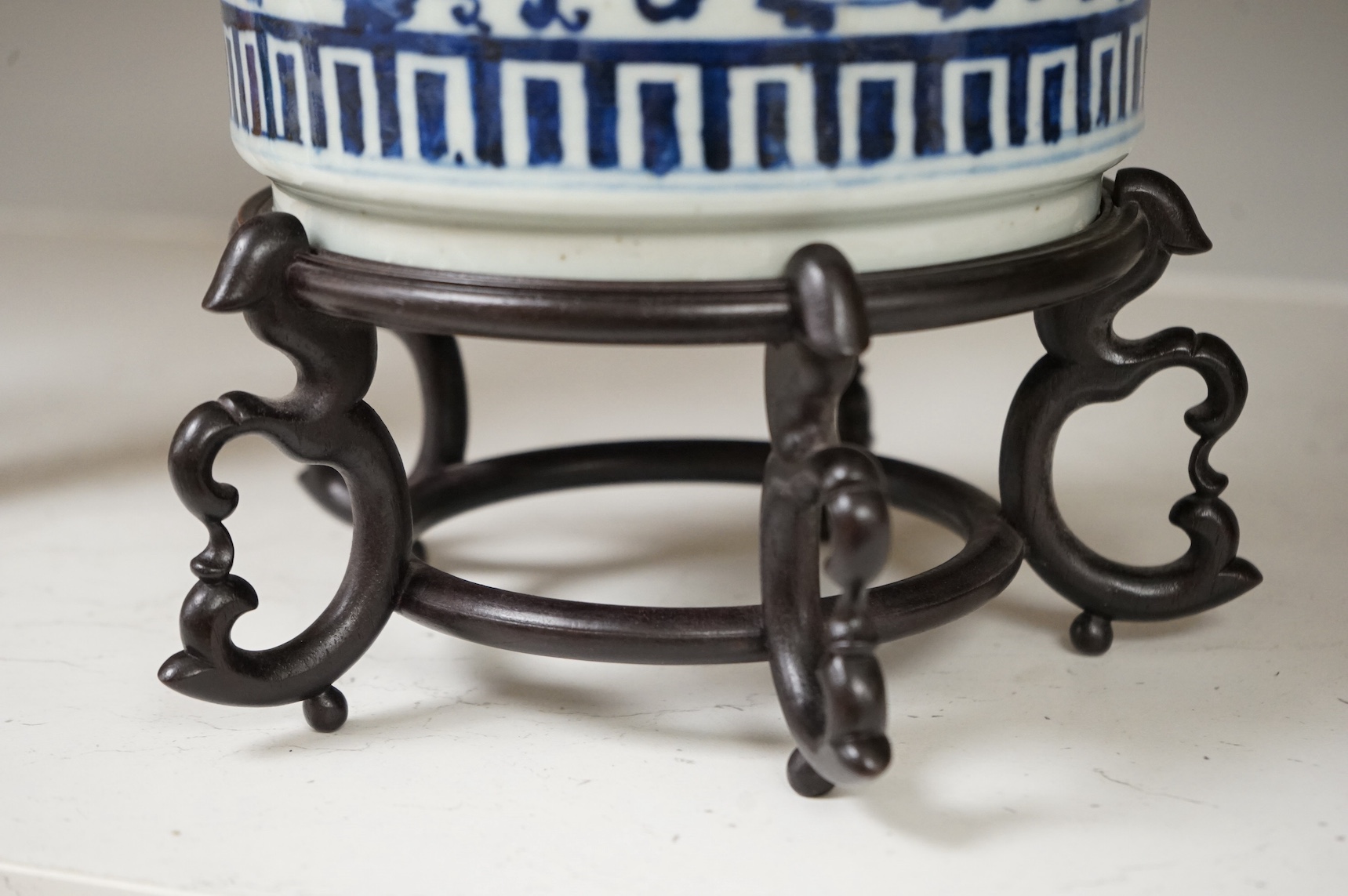 A Chinese blue and white bowl, on stand, 23cm high. Condition - fair